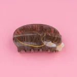 coucou suzette hair claw sleeping cat