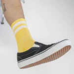 american socks mid high bubblegum καλτσες. Καλτσες σε κιτρινο χρωμα με ασπρες ριγες στο λαστιχο.